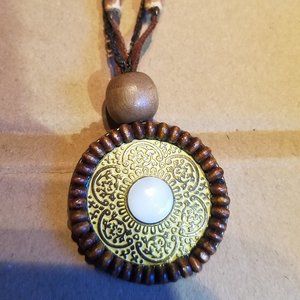 Golden Disk with Wood & Mother of Pearl Accents,